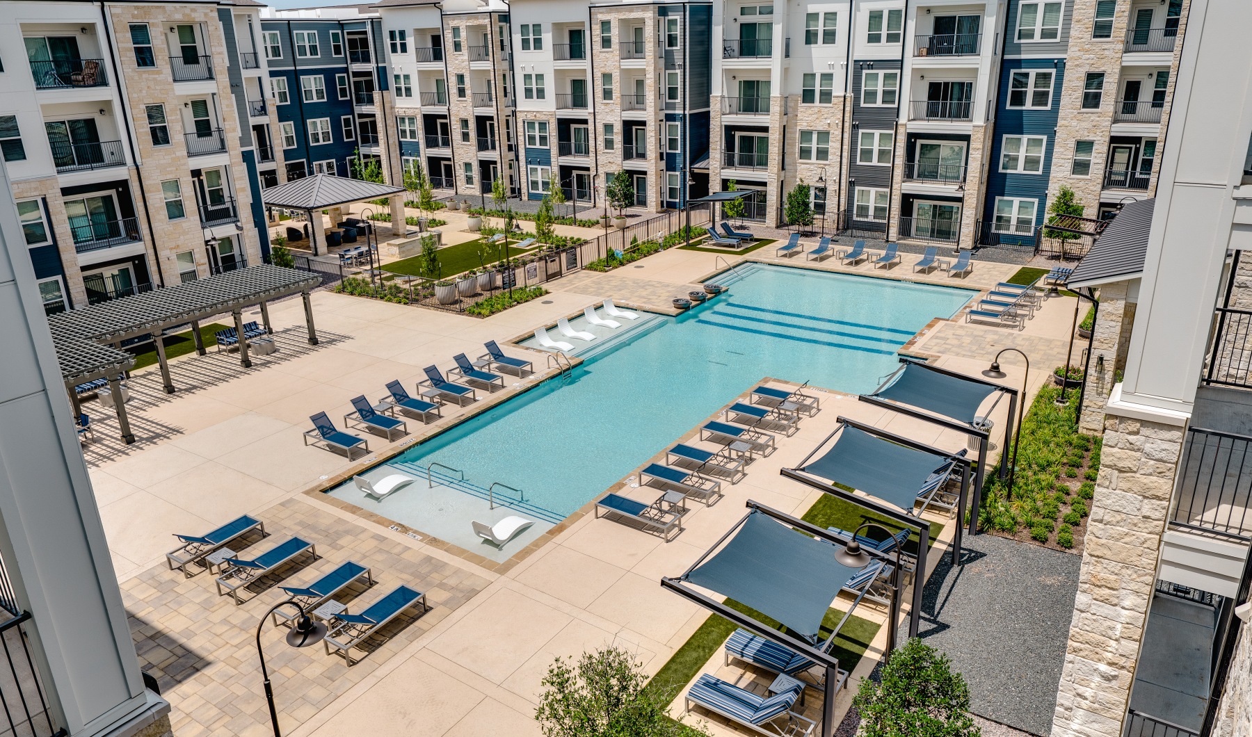 Pool Courtyard Airal photo of the pool courtyard with cabana and lounge style seating